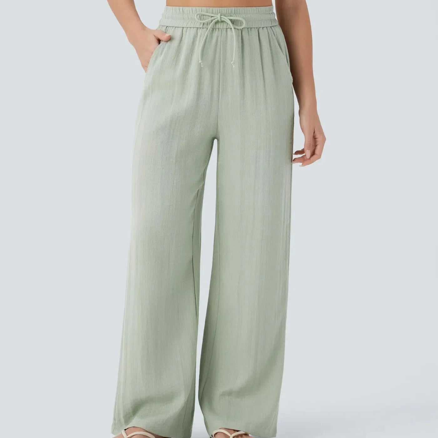 Casual linnen broek voor dames – hoge taille en wijde pijpen voor een luchtige, stijlvolle en comfortabele zomerse look.