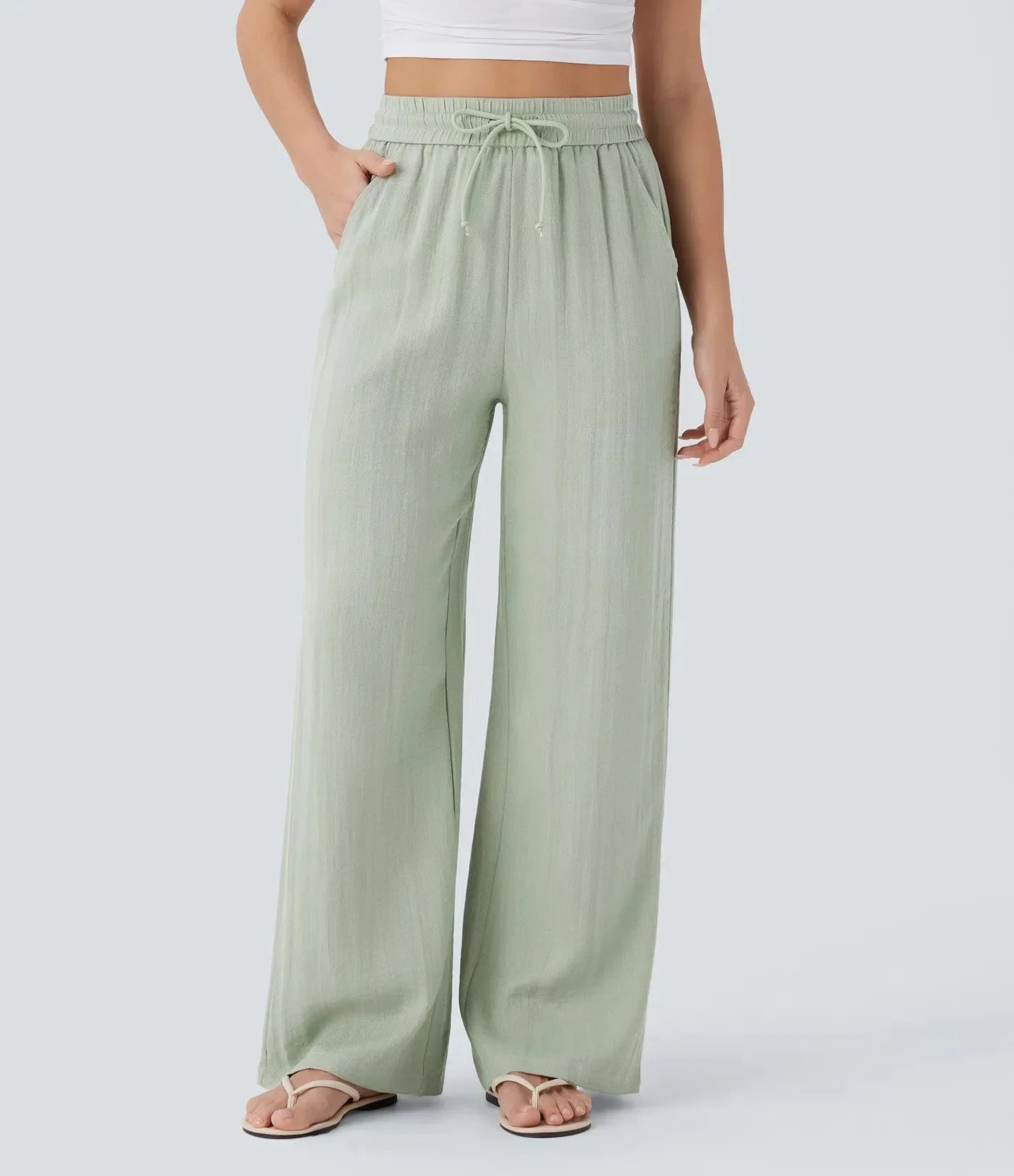 Casual linnen broek voor dames – hoge taille en wijde pijpen voor een luchtige, stijlvolle en comfortabele zomerse look.