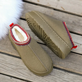 Tess suède damespantoffels – zachte, comfortabele en warme pantoffels met stijlvolle afwerking, ideaal voor relaxte dagen thuis.