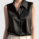 Dames blouse mouwloos met kraag en knoopsluiting