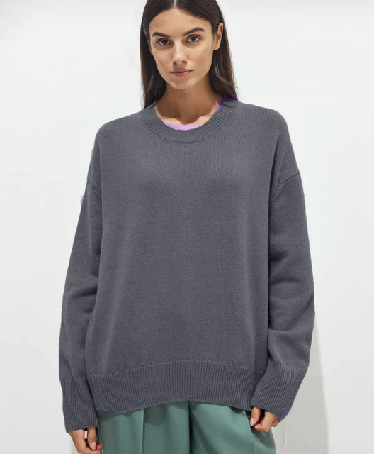 Basic damestrui van kasjmier in een effen kleur, met een tijdloos ontwerp en comfortabele pasvorm – perfect voor een elegante en warme look.