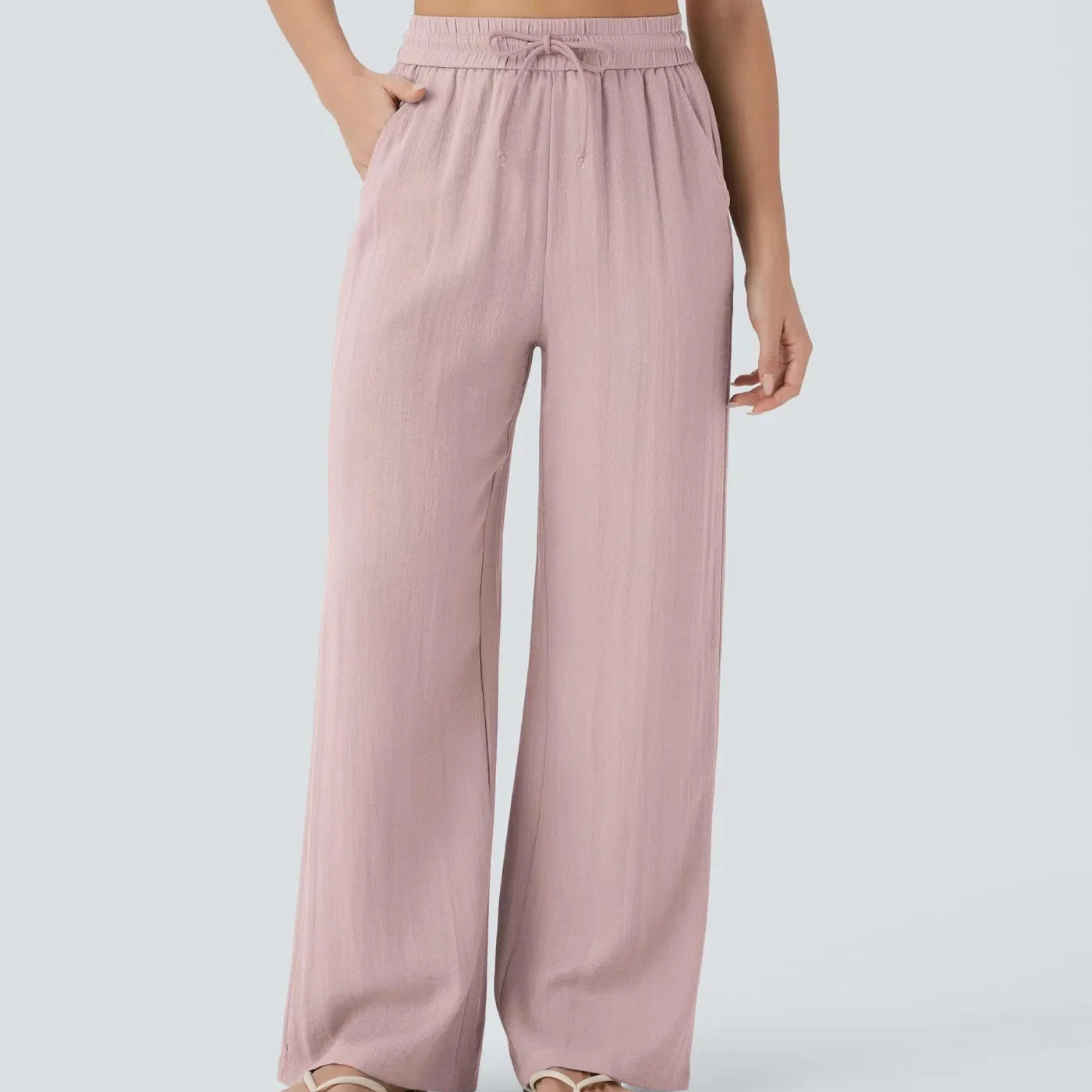 Casual linnen broek voor dames – hoge taille en wijde pijpen voor een luchtige, stijlvolle en comfortabele zomerse look.