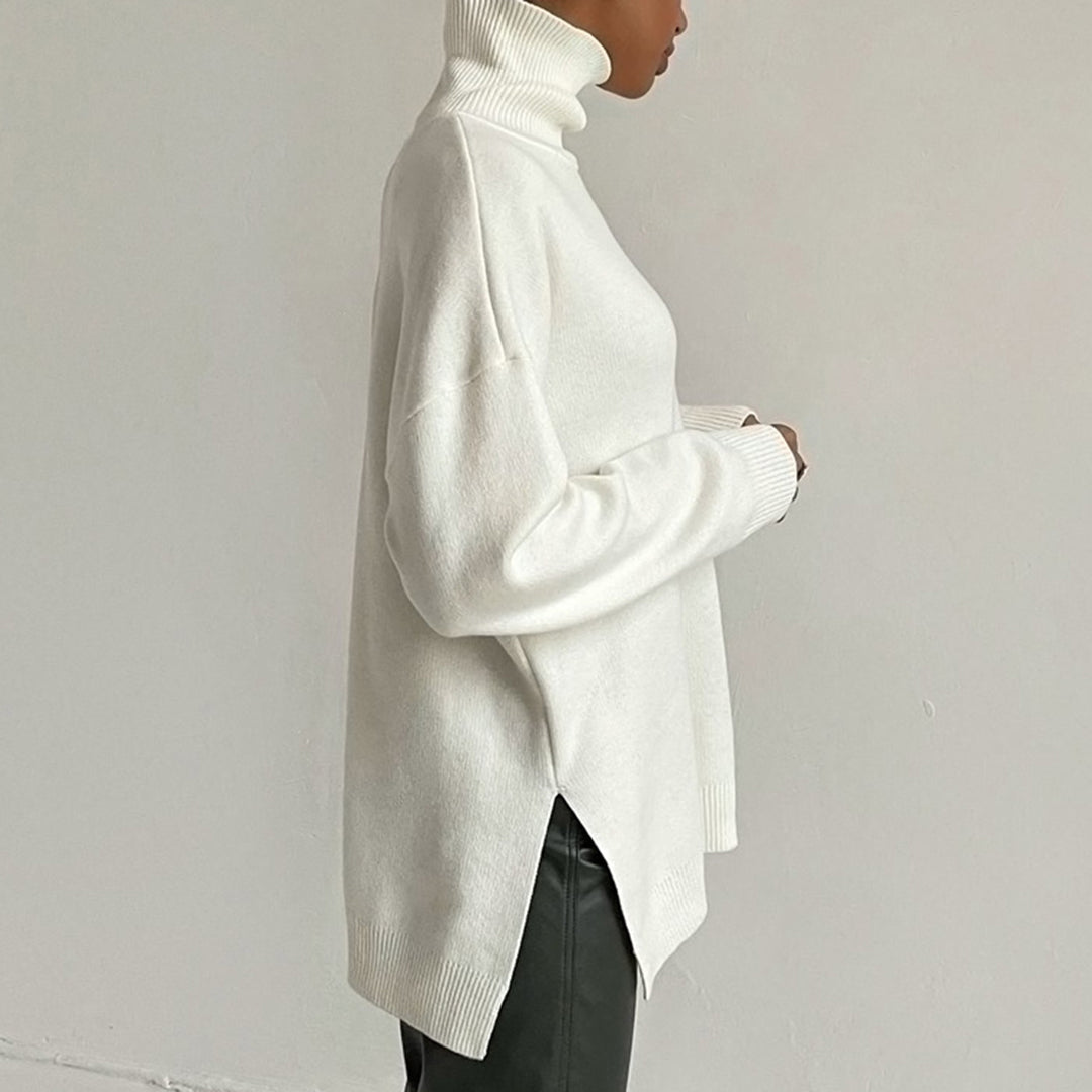 Aaliyah – Stijlvolle zijsplit trui voor dames – Trendy en comfortabele trui met split aan de zijkanten, perfect voor casual looks en moderne stijl. Ideaal voor het najaar en het combineren met jeans of een rok.