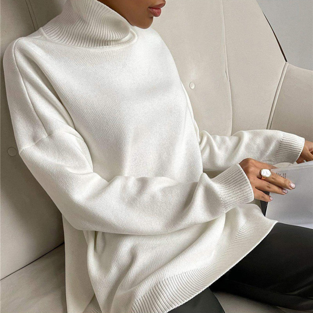 Aaliyah – Stijlvolle zijsplit trui voor dames – Trendy en comfortabele trui met split aan de zijkanten, perfect voor casual looks en moderne stijl. Ideaal voor het najaar en het combineren met jeans of een rok.