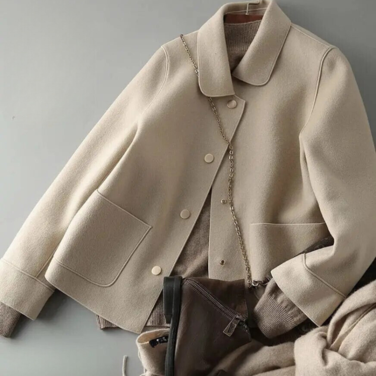 Dorias dames winterjas – warme jas met knopen en donzen vulling, waterafstotend en comfortabel, ideaal voor koude winterdagen en stijlvolle winterlooks.