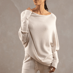 Elegante off-shoulder damestrui in een zachte stof, met lange mouwen en een flatterende pasvorm – ideaal voor een stijlvolle en vrouwelijke look.