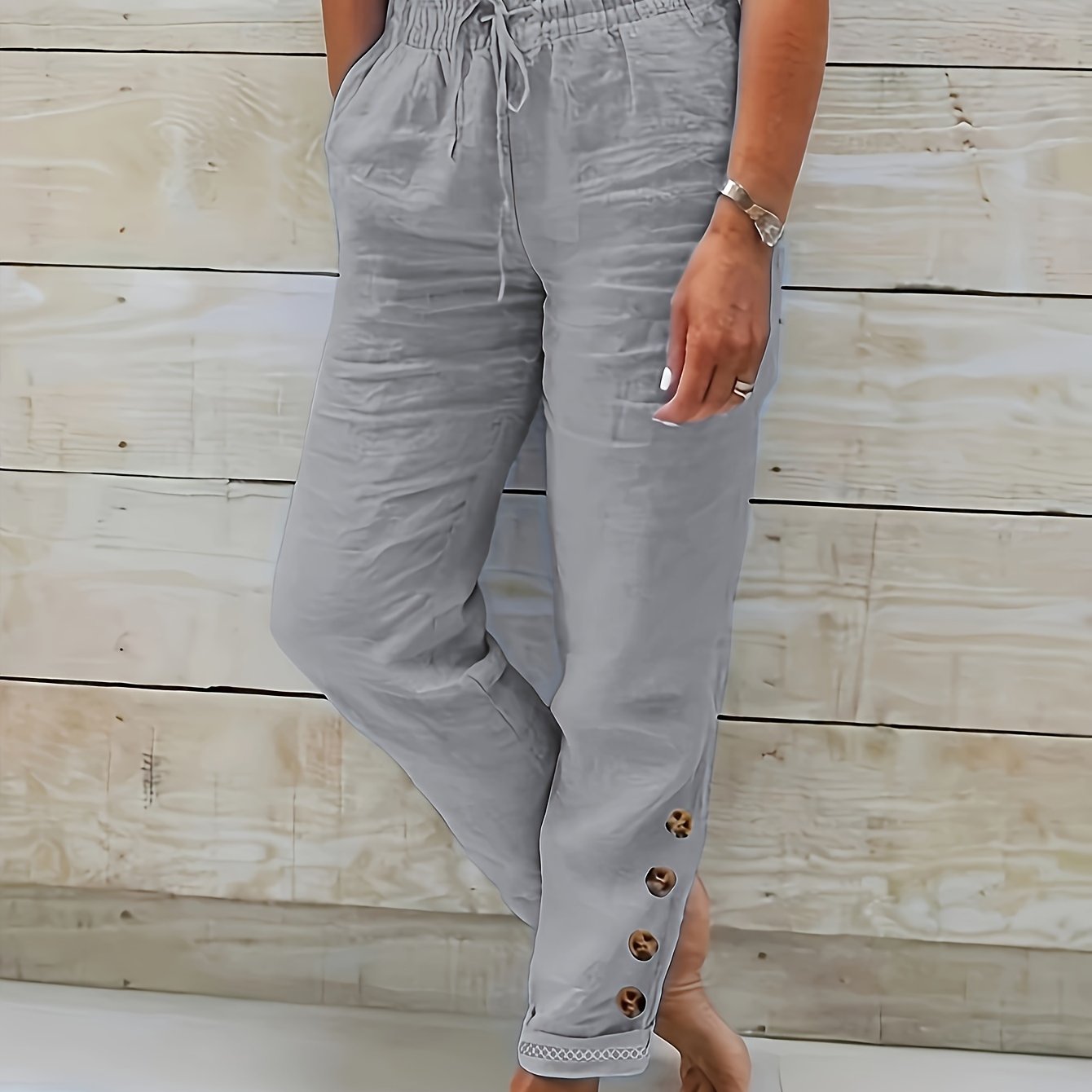 Dames broek met trekkoord en taps toelopende pijpen