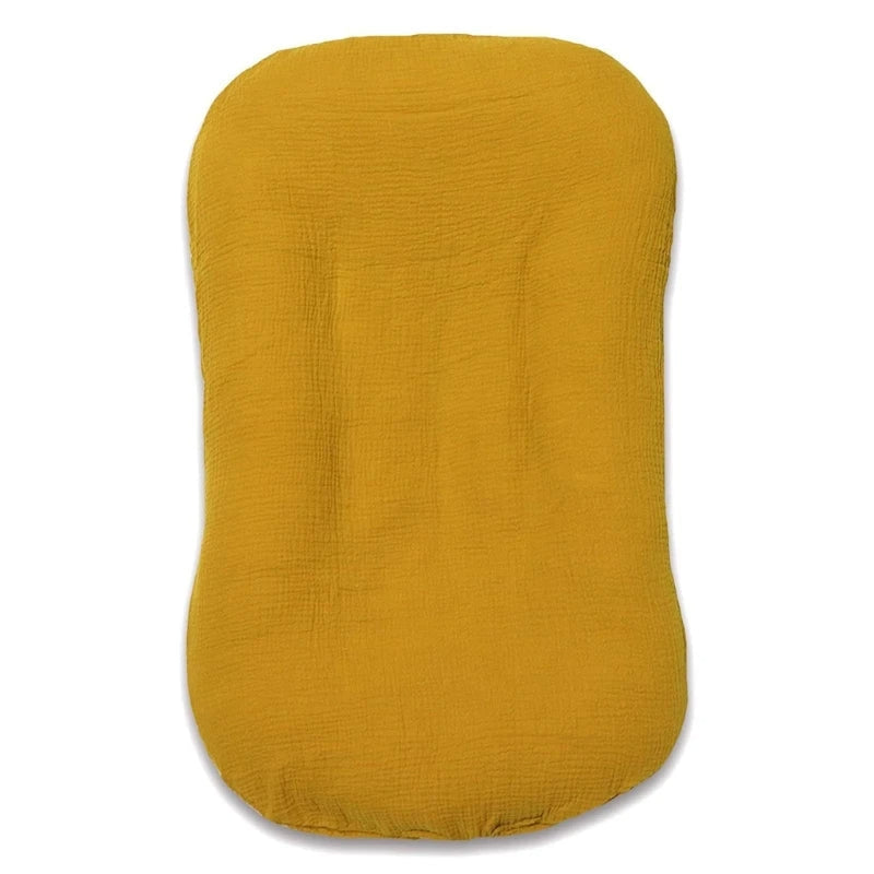 SnugiNest babynest – zacht en ademend nestje dat comfort en veiligheid biedt, ergonomisch design voor geborgen slaap van pasgeborenen.