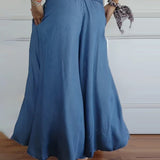 Dames broek met wijde pijpen en elastische taille