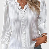 Dames blouse met V-hals en geplooide structuur