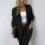 Lange gebreid damesvest in beige – zachte wolmix, comfortabele pasvorm en stijlvolle casual look.