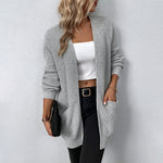 Lange gebreid damesvest in beige – zachte wolmix, comfortabele pasvorm en stijlvolle casual look.