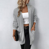 Lange gebreid damesvest in beige – zachte wolmix, comfortabele pasvorm en stijlvolle casual look.