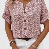 Dames blouse met bloemenprint en knoopdetails