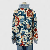 Dames blouse met bloemenprint en gestreepte details