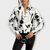 Dames blouse met abstracte print en lange mouwen