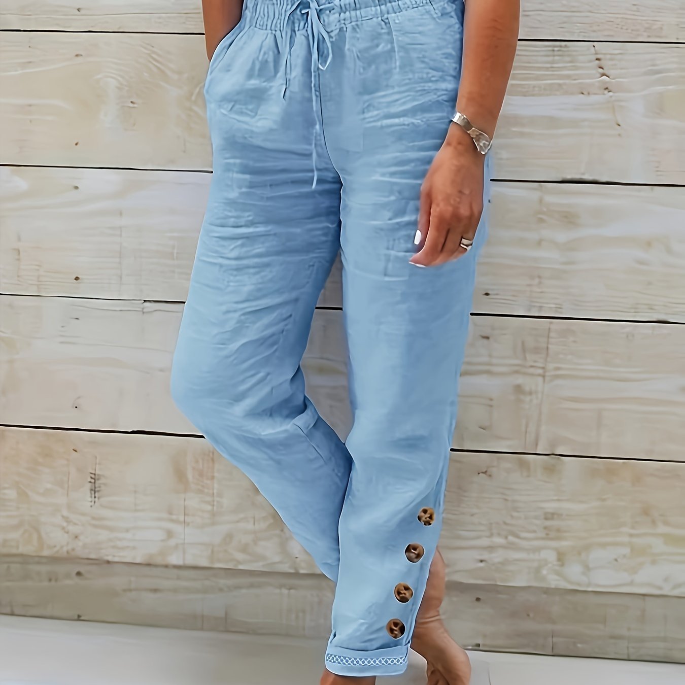 Dames broek met trekkoord en taps toelopende pijpen