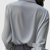 Dames blouse met gedrapeerde hals en lange mouwen