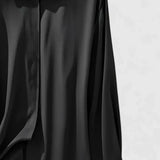 Dames blouse met gedrapeerde hals en lange mouwen