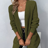 Lange gebreid damesvest in beige – zachte wolmix, comfortabele pasvorm en stijlvolle casual look.