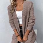 Lange gebreid damesvest in beige – zachte wolmix, comfortabele pasvorm en stijlvolle casual look.