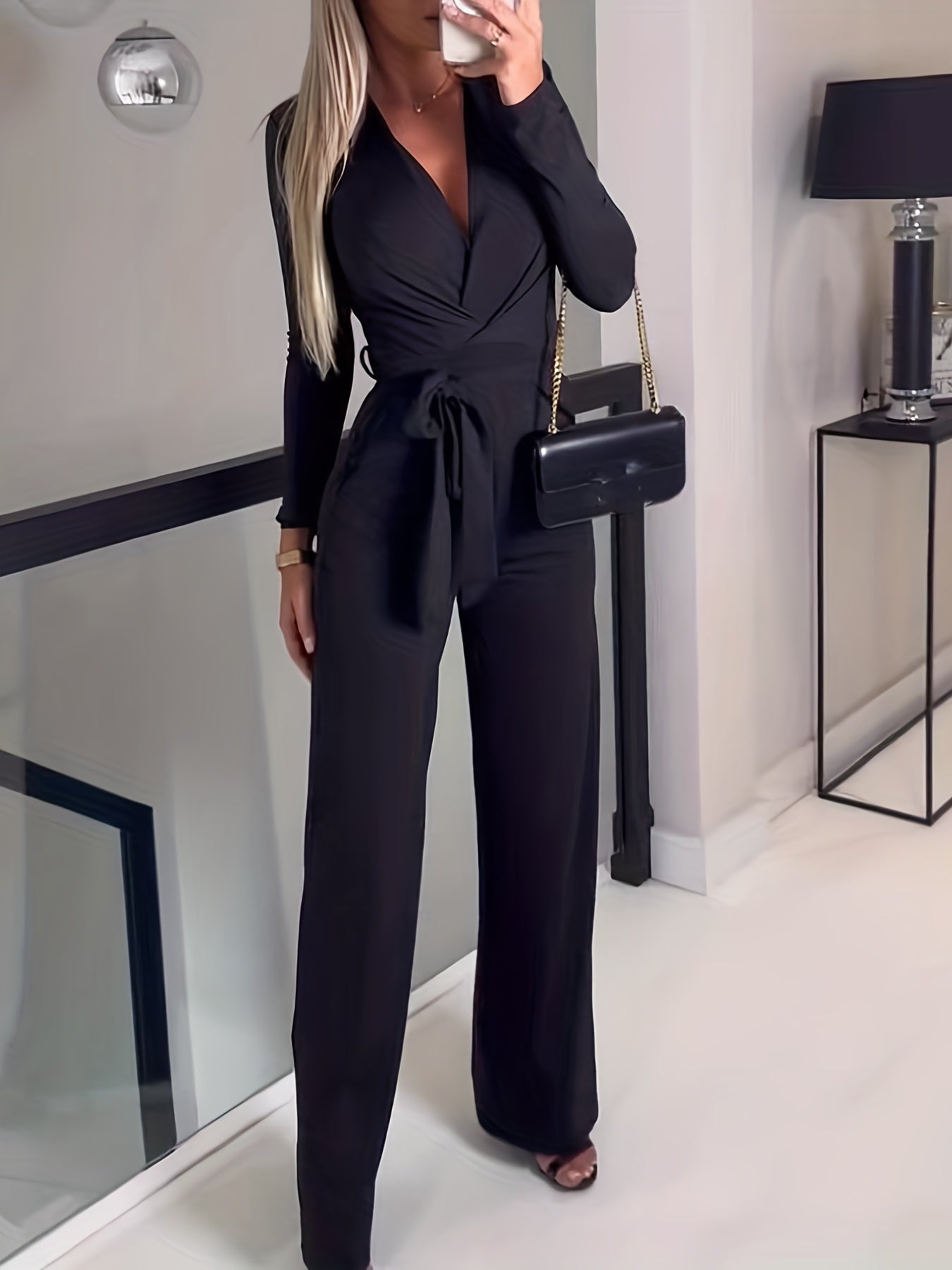 Esmee – Stijlvolle dames jumpsuit (Zwart) met lange mouwen, elegante pasvorm en comfortabele stof voor een verfijnde uitstraling.
