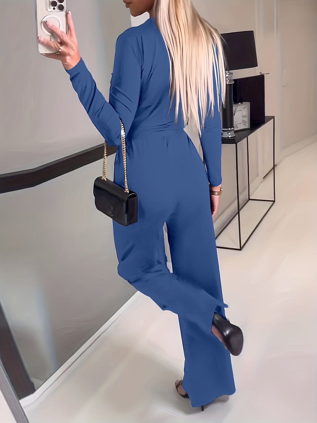 Esmee – Stijlvolle dames jumpsuit (Blauw) met lange mouwen, elegante pasvorm en comfortabele stof voor een verfijnde uitstraling.