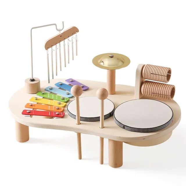 Kinder muziekstation – kleurrijke houten muziekinstrumenten set met xylofoon, trommels en bel, stimuleert ritme, creativiteit en motorische vaardigheden bij kinderen.