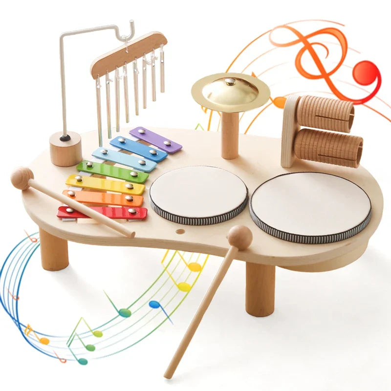 Kinder muziekstation – kleurrijke houten muziekinstrumenten set met xylofoon, trommels en bel, stimuleert ritme, creativiteit en motorische vaardigheden bij kinderen.