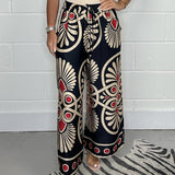 Dames broek met paisley print en wijde pijpen