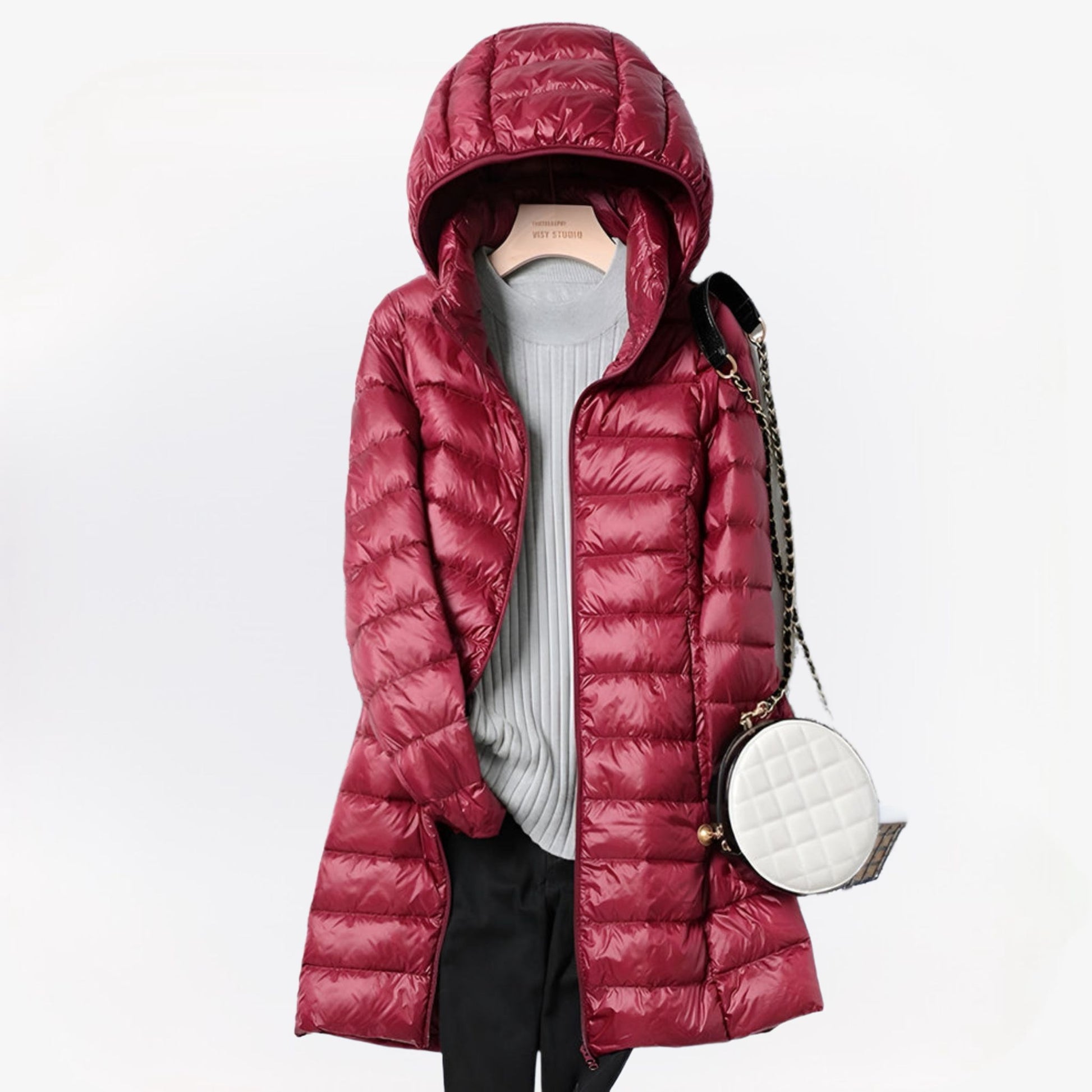 Lange dames winterjas in diverse kleuren – warme gevoerde stof, elegante pasvorm en perfecte bescherming tegen kou.