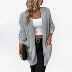 Lange gebreid damesvest in beige – zachte wolmix, comfortabele pasvorm en stijlvolle casual look.