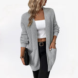 Lange gebreid damesvest in beige – zachte wolmix, comfortabele pasvorm en stijlvolle casual look.