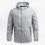 Heren windjack met capuchon in blauw – lichtgewicht, waterafstotend materiaal en comfortabele, sportieve pasvorm.