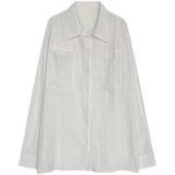 Losvallende Blouse met Borstzakken en Knopen