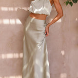 Elegante Satijnen Maxi Jurk met Hoge Hals en Mouwloos Design