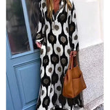 Bohemian Maxi Jurk met Geometrische Print en V-Hals