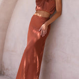 Elegante Satijnen Maxi Jurk met Hoge Hals en Mouwloos Design