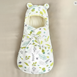CuddleNest katoenen babywikkeldeken – zachte, ademende stof, ideale pasvorm voor veilig inbakeren en comfortabel slapen.