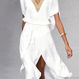 Elegante Wikkeljurk met V-Hals en Asymmetrische Zoom