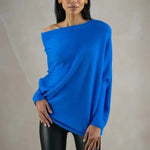 Elegante off-shoulder damestrui in een zachte stof, met lange mouwen en een flatterende pasvorm – ideaal voor een stijlvolle en vrouwelijke look.