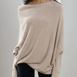 Elegante off-shoulder damestrui in een zachte stof, met lange mouwen en een flatterende pasvorm – ideaal voor een stijlvolle en vrouwelijke look.