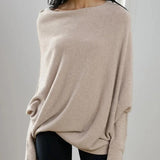 Elegante off-shoulder damestrui in een zachte stof, met lange mouwen en een flatterende pasvorm – ideaal voor een stijlvolle en vrouwelijke look.