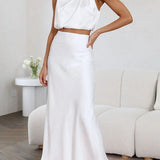 Elegante Satijnen Maxi Jurk met Hoge Hals en Mouwloos Design